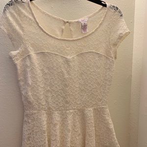 White peplum top